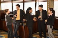 File Number: 5478304
Business people in a bar.
Ethnically diverse group of businesspeople in bar drinking and conversing. 
Credit:   Ron Chapple /  iStockphoto

(Royalty-Free)