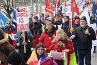 Members of the Public Service Alliance of Canada (PSAC) demonstrate outside the Treasury Board building in Ottawa on Friday, March 31, 2023. THE CANADIAN PRESS/ Patrick Doyle