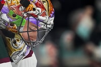 Arizona Coyotes goaltender Karel Vejmelka looks down during the third period of the team's NHL hockey game against the Seattle Kraken, Tuesday, April 9, 2024, in Seattle. (AP Photo/Lindsey Wasson)