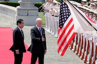 FILE PHOTO: U.S. President Joe Biden and Japanese Prime Minister Fumio Kishida review an honor guard during a welcome ceremony for President Biden, at the Akasaka Palace state guest house in Tokyo, Japan, May 23, 2022. Eugene Hoshiko/Pool via REUTERS/File Photo