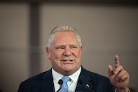 Ontario Premier Doug Ford says he does want to raise tuition for post-secondary students. Ford answers questions during a press conference at the Toronto Police College in Etobicoke, Ont., on Tuesday, April 25, 2023.  THE CANADIAN PRESS/ Tijana Martin