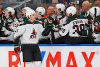 Apr 12, 2024; Edmonton, Alberta, CAN; The Arizona Coyotes celebrate a goal scored by forward Josh Doan (91) during the first period against the Edmonton Oilers at Rogers Place. Mandatory Credit: Perry Nelson-USA TODAY Sports