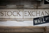 The Wall Street entrance to the New York Stock Exchange (NYSE) is seen in New York City, U.S., November 15, 2022.