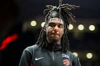 Toronto Raptors guard Kira Lewis Jr. (13), looks on during a time out in second half NBA basketball action against the Chicago Bulls, in Toronto on Thursday, January 18, 2024. THE CANADIAN PRESS/Christopher Katsarov