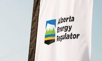 The Alberta Energy Regulator logo is seen on a flag at the opening of the regulator's office in Calgary in an undated handout photo. Alberta's energy regulator is defending its finding that the province's largest recorded earthquake was caused by oilpatch activity. THE CANADIAN PRESS/HO-Alberta Energy Regulator, *MANDATORY CREDIT*