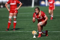Team Canada’s Sophie de Goede lines up for a penalty kick against Team Italy during second half test match rugby action at Starlight Stadium in Langford, B.C., on Sunday, July 24, 2022. Victoria's de Goede will lead Canada at the Women's Rugby World Cup. THE CANADIAN PRESS/Chad Hipolito