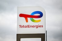 (FILES) This photograph taken on October 5, 2022, shows a logo of Total Energies at a gas station in Genech, northern France. French oil and gas major TotalEnergies announced on February 7, 2024 a net income of $21.4 billion (19.8 billion euros) for 2023, a new record after the extraordinary year of 2022. (Photo by Sameer Al-DOUMY / AFP) (Photo by SAMEER AL-DOUMY/AFP via Getty Images)