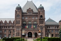 The Ontario legislature's front entrance at Queen's Park is seen in Toronto, Friday, June 18, 2021. At 130 years old, Ontario's legislature is showing its age. There are lead pipes and asbestos running through the walls, mountains of old cables and wires stacked on top of new ones, an inefficient steam heating system with parts that frequently fail and fire safety systems in need of upgrading. THE CANADIAN PRESS/Chris Young