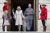 Prince Charles and his wife Camilla are saluted by members of the RCMP as they leave the Provincial Legislature in Regina, on Wednesday, May 23, 2012 . The royal couple are on a four-day visit to Canada to mark the Queen's Diamond Jubilee. THE CANADIAN PRESS/Paul Chiasson