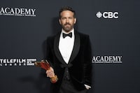 Ryan Reynolds poses with the Humanitarian Award at the Comedy and TV Drama awards evening at the Canadian Screen Awards, in Toronto, on Friday, April 14, 2023. Reynolds has received his home province's top honour after being named to the Order of British Columbia.THE CANADIAN PRESS/Chris Young