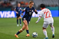 Netherlands' midfielder #18 Kerstin Casparij and Vietnam's defender #22 Thi My Anh Nguyen vie for the ball during the Australia and New Zealand 2023 Women's World Cup Group E football match between Vietnam and the Netherlands at Dunedin Stadium in Dunedin on August 1, 2023. (Photo by Sanka Vidanagama / AFP) (Photo by SANKA VIDANAGAMA/AFP via Getty Images)
