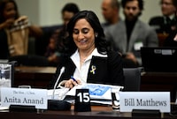 Minister of National Defence Anita Anand opens her notes as she prepares to appear as a witness at the Standing Committee on National Defence, regarding the surveillance balloon from the People's Republic of China, in Ottawa, on Tuesday, March 7, 2023. THE CANADIAN PRESS/Justin Tang