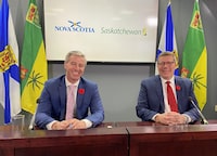 Nova Scotia Premier Tim Houston and Saskatchewan Premier Scott Moe attend a news conference in Halifax on Tuesday, Nov.7, 2023. The premiers are emphasizing the need for provinces to be at the table when Ottawa strikes housing deals directly with municipalities. THE CANADIAN PRESS/Keith Doucette