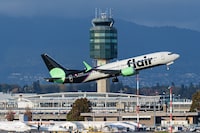 A Flair Airlines 737 MAX 8 jetliner (C-FLKA) takes off from Vancouver International Airport, Richmond, B.C., on Friday, October 28, 2022. THE CANADIAN PRESS IMAGES/Bayne Stanley
