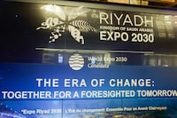 This photograph shiws the logo of "Riyadh Expo 2030" at the Palais des Congres in Issy-les-Moulineaux, Paris' suburb, on November 28, 2023, following the announcement of Saudi Arabia's Royal Commission for Riyadh City winning the host of the 2030 World Expo, the showpiece event held every five years. The World Expo, which traces its history back to the 1851 Great Exhibition in London, is a months-long mega event attracting millions of visitors that aims to respond to the specific challenges of the current time. (Photo by Geoffroy VAN DER HASSELT / AFP) (Photo by GEOFFROY VAN DER HASSELT/AFP via Getty Images)