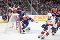 Florida Panthers' Carter Verhaeghe (23) scores on Edmonton Oilers goalie Calvin Pickard (30) during first period NHL action in Edmonton on Saturday Dec. 16, 2023. THE CANADIAN PRESS/Jason Franson