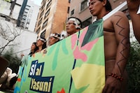 Waorani Indigenous attend an event promoting a "yes" vote in a referendum on not extracting oil in Quito, Ecuador, Monday, Aug. 14, 2023. (AP Photo/Dolores Ochoa)