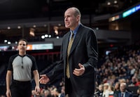 Carleton Ravens head coach Dave Smart reacts to a foul call during the first half of semifinal action in the U Sports men's basketball national championship in Halifax on Saturday, March 10, 2018. THE CANADIAN PRESS/Darren Calabrese