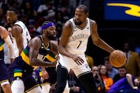 Jan 6, 2023; New Orleans, Louisiana, USA;  Brooklyn Nets forward Kevin Durant (7) dribbles against New Orleans Pelicans forward Naji Marshall (8) during the second half at Smoothie King Center. Mandatory Credit: Stephen Lew-USA TODAY Sports