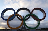 (FILES) The Olympic rings installed on the Esplanade du Trocadero near the Eiffel tower following the Paris' nomination as host for the 2024 Olympics, are pictured on September 14, 2017 in Paris. January 26, 2024 marks the six-month countdown to the opening ceremony kicking off the Paris 2024 Olympic Games which begin on July 26, 2024. (Photo by LUDOVIC MARIN / AFP) (Photo by LUDOVIC MARIN/AFP via Getty Images)