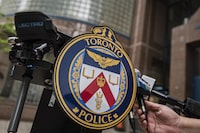 <div>Toronto police say the alleged killer in a decades-old cold case has been identified using DNA testing and investigative genetic genealogy. The Toronto Police Services emblem is photographed during a press conference at TPS headquarters, in Toronto on Tuesday, May 17, 2022. THE CANADIAN PRESS/Christopher Katsarov</div>