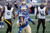 Winnipeg Blue Bombers' Rasheed Bailey (88) crosses the line for the touchdown against the Hamilton Tiger-Cats during first half CFL action in Winnipeg Friday, June 9, 2023.  THE CANADIAN PRESS/John Woods