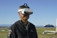 Richard Gordon tests out the virtual reality environment on Qikiqtaruk, Y.T., in an undated handout photo. The VR project Qikiqtaruk: Arctic at Risk is transporting people to Yukon's northernmost point without them ever having to leave home. THE CANADIAN PRESS/HO-Isla Myers-Smith, *MANDATORY CREDIT*