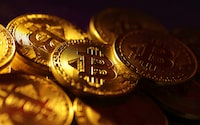 FILE PHOTO: Physical representations of the bitcoin cryptocurrency are seen in this illustration taken October 24, 2023. REUTERS/Dado Ruvic/Illustration/File Photo