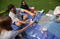 People are seeing drinking alcohol at the Trinity Bellwoods Park on Wednesday, August 02, 2023. The City of Toronto launches pilot project that allows alcohol in 27 parks around the city. The project takes place between August 2 to October 9. Arif Balkan/The Globe and Mail