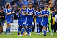LEICESTER, ENGLAND - MAY 28: Youri Tielemans and James Maddison of Leicester City look dejected after their sides defeat, resulting in their relegation to the Championship during the Premier League match between Leicester City and West Ham United at The King Power Stadium on May 28, 2023 in Leicester, England. (Photo by Ross Kinnaird/Getty Images)
