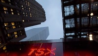 A TSX sign is pictured in Toronto, on Dec.31, 2012. THE CANADIAN PRESS/Frank Gunn