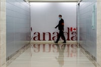 A security guard walks at the Canada's Consulate General, in Shanghai, China, May 10, 2023. REUTERS/Aly Song