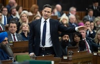 Leader of the Conservative Party Pierre Poilievre rises in response to the Speaker of the House of Commons during question period, Tuesday, April 30, 2024 in Ottawa.  THE CANADIAN PRESS/Adrian Wyld