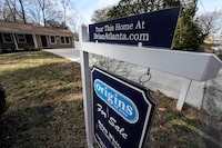 FILE - A sign announcing a home for sale is shown on Feb. 1, 2024, in Kennesaw, Ga., near Atlanta. On Thursday, April 18, 2024, Freddie Mac reports on this week's average U.S. mortgage rates. (AP Photo/Mike Stewart, File)