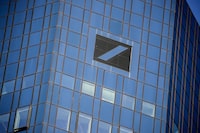 (FILES) The logo of German bank Deutsche Bank is seen on their headquarters in Frankfurt am Main, western Germany, on February 4, 2021, as the bank publishes its preliminary results for the 2020 financial year. Germany's biggest lender Deutsche Bank on February 1, 2024 announced plans to slash 3,500 jobs as part of a major cost-cutting drive after its net profit fell in 2023. The group reported a net profit attributable to shareholders of 4.2 billion euros (USD 4.5 billion), a 16-percent drop on the year before when profits were boosted by a one-off tax benefit. (Photo by Armando BABANI / AFP) (Photo by ARMANDO BABANI/AFP via Getty Images)