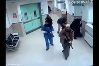 This grab taken from a UGC video released on social media on January 30, 2024 shows CCTV footage displayed on a computer screen reportedly of a deadly raid by undercover Israeli troops at the Ibn Sina hospital in the northern city of Jenin in the occupied West Bank. Israeli undercover agents, some disguised as medical staff, raided a West Bank hospital on January 30 and shot dead three Palestinian militants, in the first such operation in eight years. The Israeli military said forces entered the hospital -- a major health facility serving Jenin city and its adjacent refugee camp -- to target a "Hamas terrorist cell". (Photo by UGC / AFP) / RESTRICTED TO EDITORIAL USE  MANDATORY CREDIT «  AFP PHOTO / SOCIAL MEDIA  » - NO MARKETING NO ADVERTISING CAMPAIGNS  DISTRIBUTED AS A SERVICE TO CLIENTS (Photo by -/UGC/AFP via Getty Images)