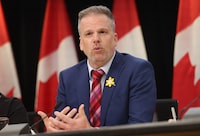 Minister of Health Mark Holland participates in a news conference to announce a new youth mental health fund at the National Press Theatre in Ottawa on Tuesday, April 9, 2024. THE CANADIAN PRESS/ Patrick Doyle