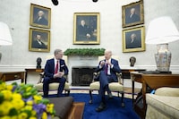 President Joe Biden, right, speaks as Prime Minister Petr Fiala of the Czech Republic listens during a meeting in the Oval Office at the White House, Monday, April 15, 2024. (AP Photo/Manuel Balce Ceneta)