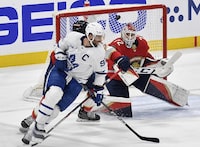 Florida Panthers goaltender Sergei Bobrovsky (72) stops the puck in front of Toronto Maple Leafs center John Tavares (91) during the second period of Game 3 of an NHL hockey Stanley Cup second-round playoff series, Sunday, May 7, 2023, in Sunrise, Fla. (AP Photo/Michael Laughlin)