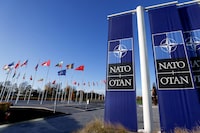 FILE PHOTO: Flags fly outside NATO headquarters in Brussels, Belgium, November 16, 2022. REUTERS/Yves Herman