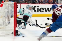 Apr 26, 2023; Denver, Colorado, USA; Seattle Kraken goaltender Philipp Grubauer (31) blocks the shot of Colorado Avalanche left wing Artturi Lehkonen (62) in the second period in game five of the first round of the 2023 Stanley Cup Playoffs at Ball Arena. Mandatory Credit: Ron Chenoy-USA TODAY Sports