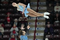 Brooke McIntosh and Benjamin Mimar of Ontario perform during the senior pairs short program at the Canadian Figure Skating Championships in Oshawa, Ont., on Friday, January 13, 2023. THE CANADIAN PRESS/Nathan Denette
