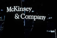 This photograph shows a logo of American multinational corporation McKinsey & Company on the first day of the Mobile World Congress (MWC), the telecom industry's biggest annual gathering, in Barcelona on February 26, 2024. The world's biggest mobile phone fair throws open its doors in Barcelona with the sector looking to artificial intelligence to try and reverse declining sales. (Photo by PAU BARRENA / AFP) (Photo by PAU BARRENA/AFP via Getty Images)