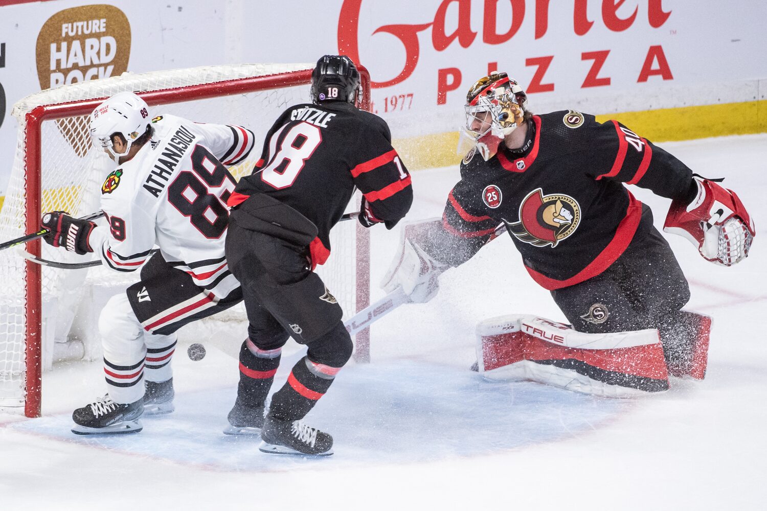 Athanasiou, Kane lead Blackhawks to 4-3 overtime win over Senators