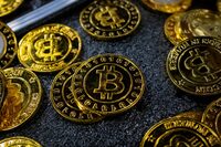 Bitcoin coins are seen at a stand during the Bitcoin Conference 2023, in Miami Beach, Florida on May 19, 2023.