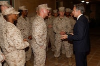 FILE PHOTO: U.S. Secretary of State Antony Blinken exchanges challenge coins with the U.S. Marine Corps embassy security guard detachment in Baghdad, Iraq, November 5, 2023. REUTERS/Jonathan Ernst/Pool/File Photo