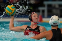 The Canadian women's water polo team has one more chance to qualify for the 2024 Paris Olympics after a 10-8 loss to Australia on Wednesday at the world aquatics championships. Canada's Kindred Paul takes a shot against the United States during the women's water polo gold medal match at the Pan American Games in Santiago, Chile, Saturday, Nov. 4, 2023. THE CANADIAN PRESS/AP/Matias Delacroix