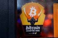 A Bitcoin Accepted Here sticker is seen at Pubkey Bar on February 29, 2024 in New York City.