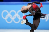 FILE - Kamila Valieva, of the Russian Olympic Committee, competes in the women's team free skate program during the figure skating competition at the 2022 Winter Olympics, Monday, Feb. 7, 2022, in Beijing. Russian figure skater Kamila Valieva has been disqualified from the 2022 Beijing Olympics. The verdict from the Court of Arbitration for Sport comes almost two years after Valieva's doping case caused turmoil at the Beijing Games. (AP Photo/Natacha Pisarenko, File)