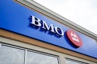 A Bank of Montreal sign is pictured in Ottawa on Monday, July 11, 2022. BMO Financial Group raised its dividend as it reported its fourth-quarter profit fell compared with a year ago.THE CANADIAN PRESS/Sean Kilpatrick
